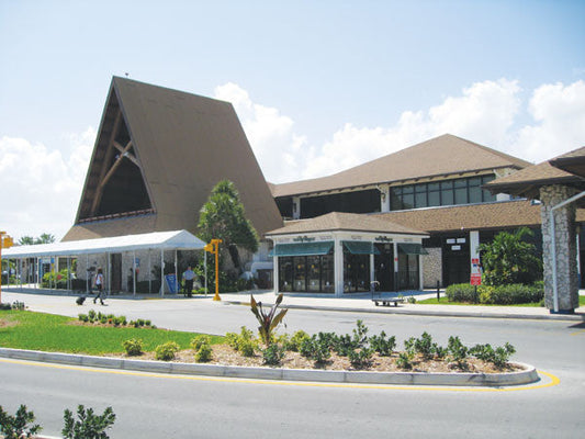 Expansion of Grand Cayman’s airport and the construction of the 2 new cruise piers