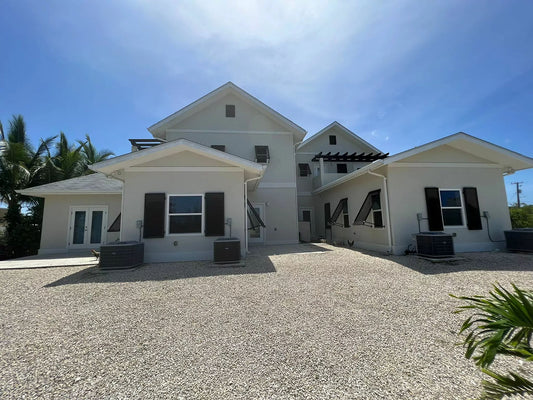 What is the cost to construct a property in the Cayman Islands?