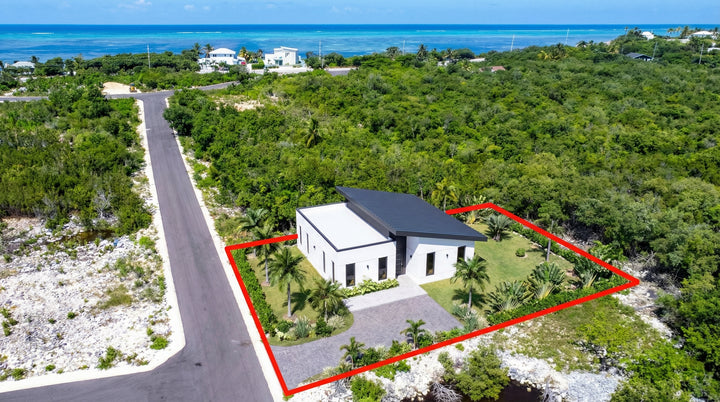 3D rendered home concept on P10 Rum Retreat land lot in Cayman Islands with ocean views